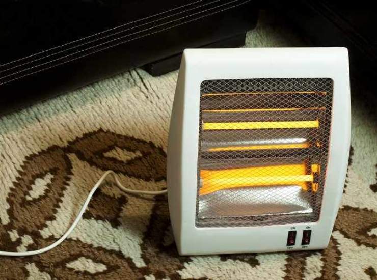 calentador eléctrico en la alfombra